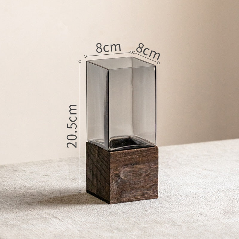 Glass square vase with wooden base