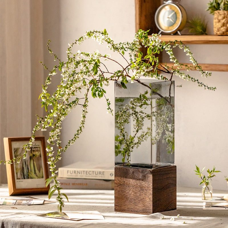 Glass square vase with wooden base
